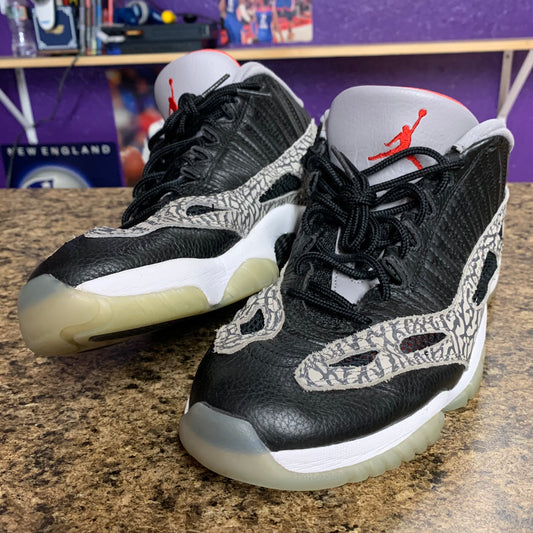 Jordan 11 Retro Low IE Black Cement 10